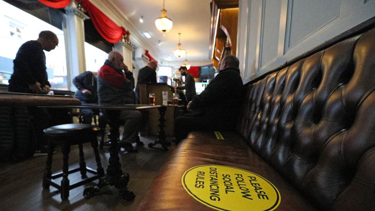 People in a pub in Liverpool, parts of the North of England are bracing themselves for the most stringent Tier 3 controls, with Merseyside expected to have its pubs, gyms and casinos closed in a bid to suppress its infection rate.