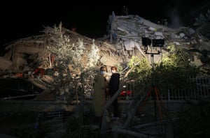 Rescue services search for survivors in the debris of a collapsed building in İzmir, Turkey
