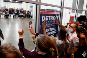 Trump supporters outside a room where absentee ballots were being counted at the TCF Centre in Detroit, Michigan