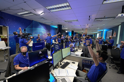 Engineers at Lockheed Martin celebrated when NASA’s OSIRIS-REx spacecraft touched down and collected a sample of asteroid Bennu on Oct. 20, 2020.