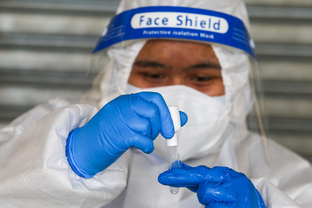 Inter-state travel and ship crews using illegal jetties led to a sudden surge in Covid-19 cases in Labuan. — Picture by Choo Choy May